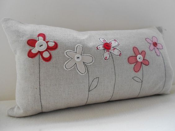 cojines con apliques de tela