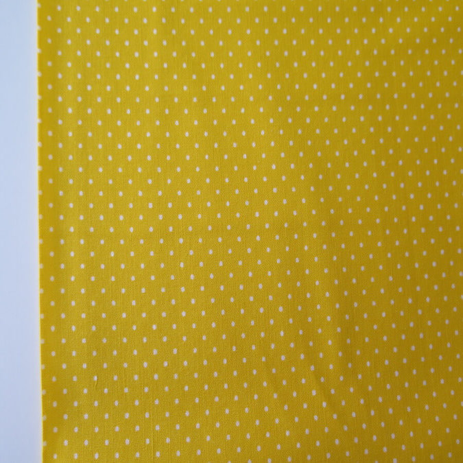 tela estampadas de pequeños lunares amarilla